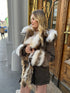 Luksuzna parka s prirodnim rakun krznom – Premium Winter Statement